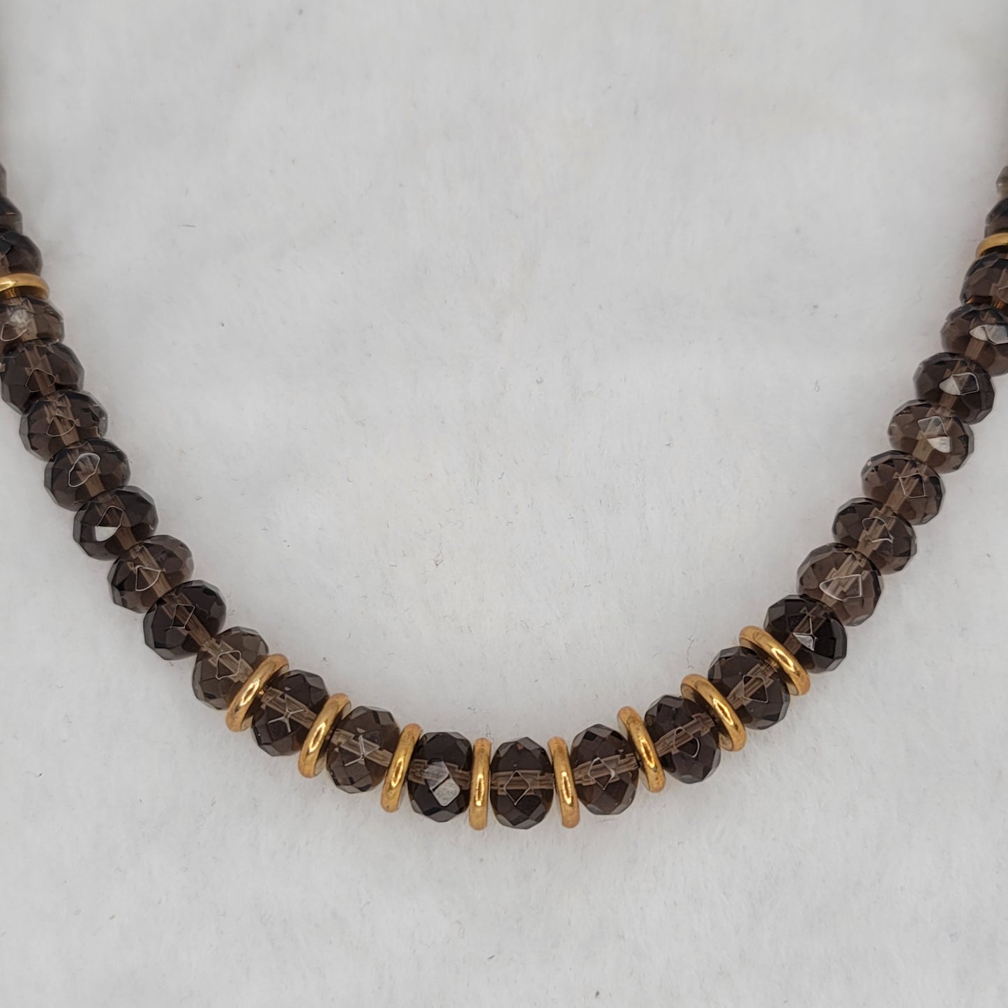 Authentic Smokey Quartz faceted and brass spacer necklace.
