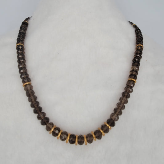 Authentic Smokey Quartz faceted and brass spacer necklace.