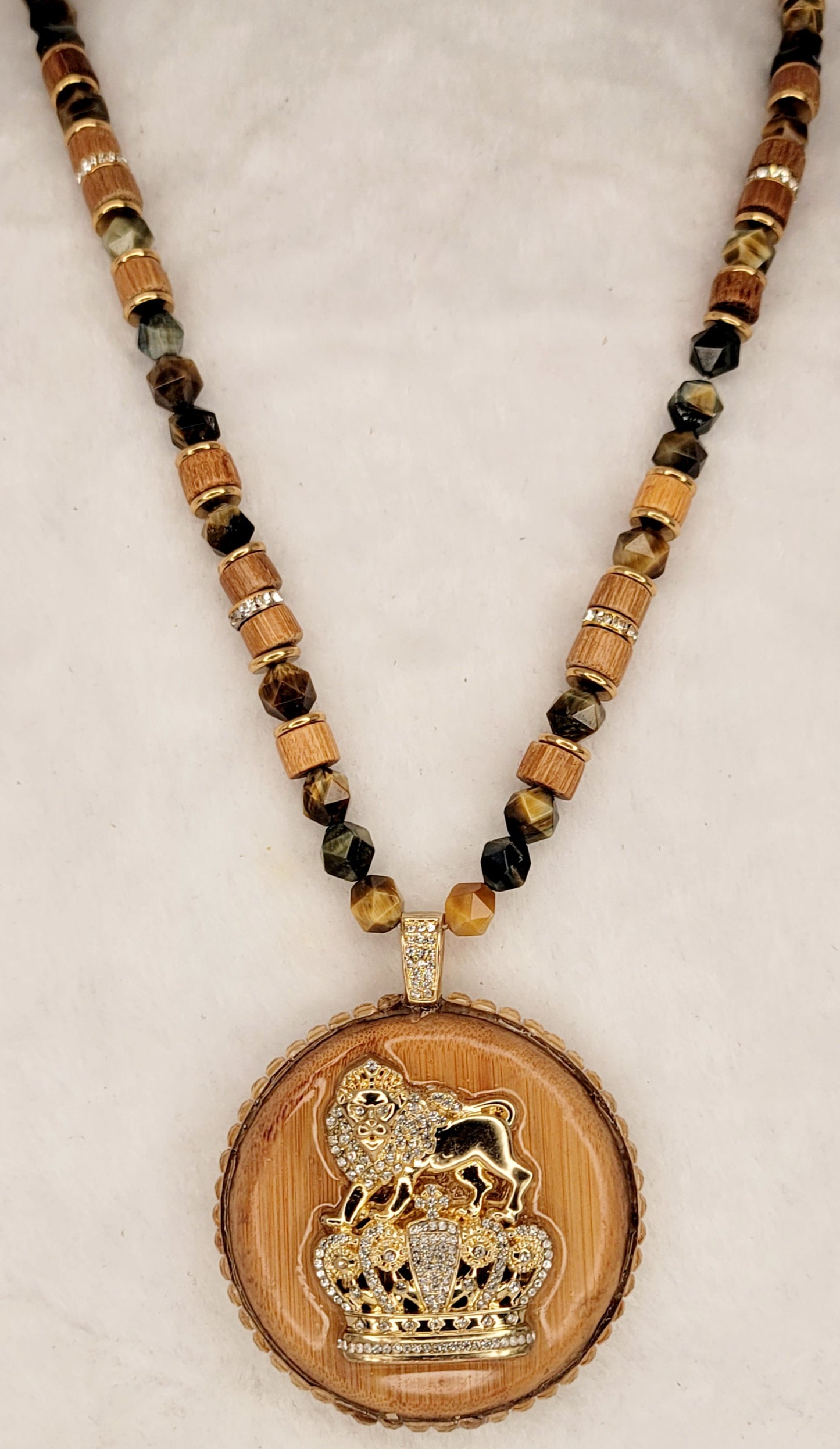 Wood Medallion Pendant necklace with metal Lion of Judah & Crown with Yellow Tiger's eye, wood and crystal spacer beads.