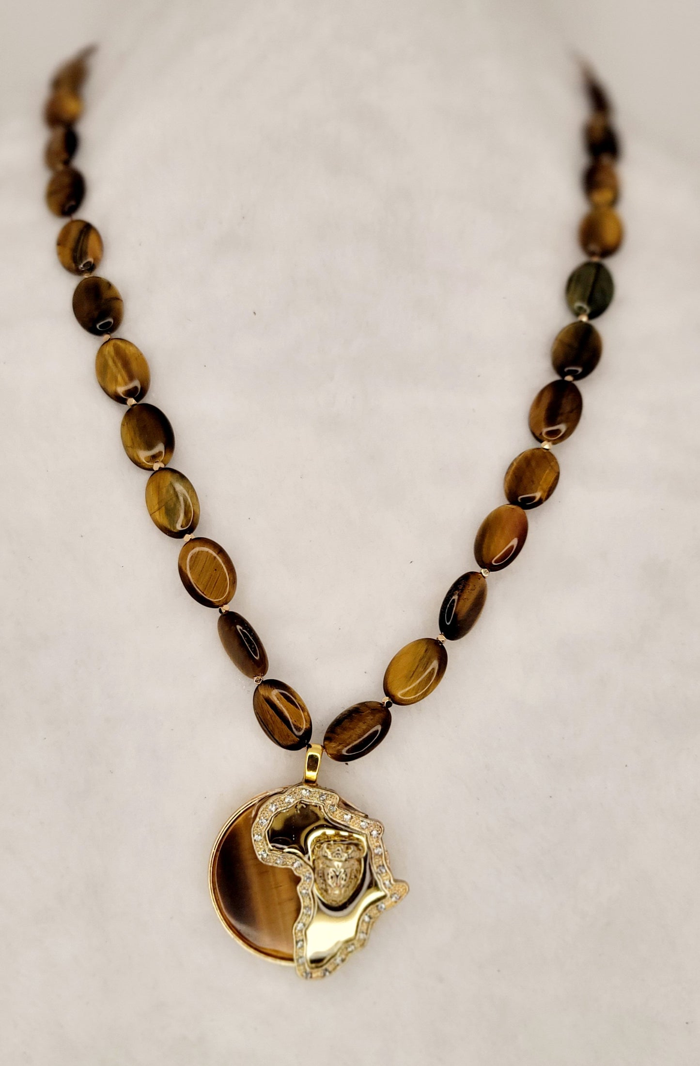 Authentic Tiger's eye African continent circle pendant with tiger's eye flat oval bead necklace.